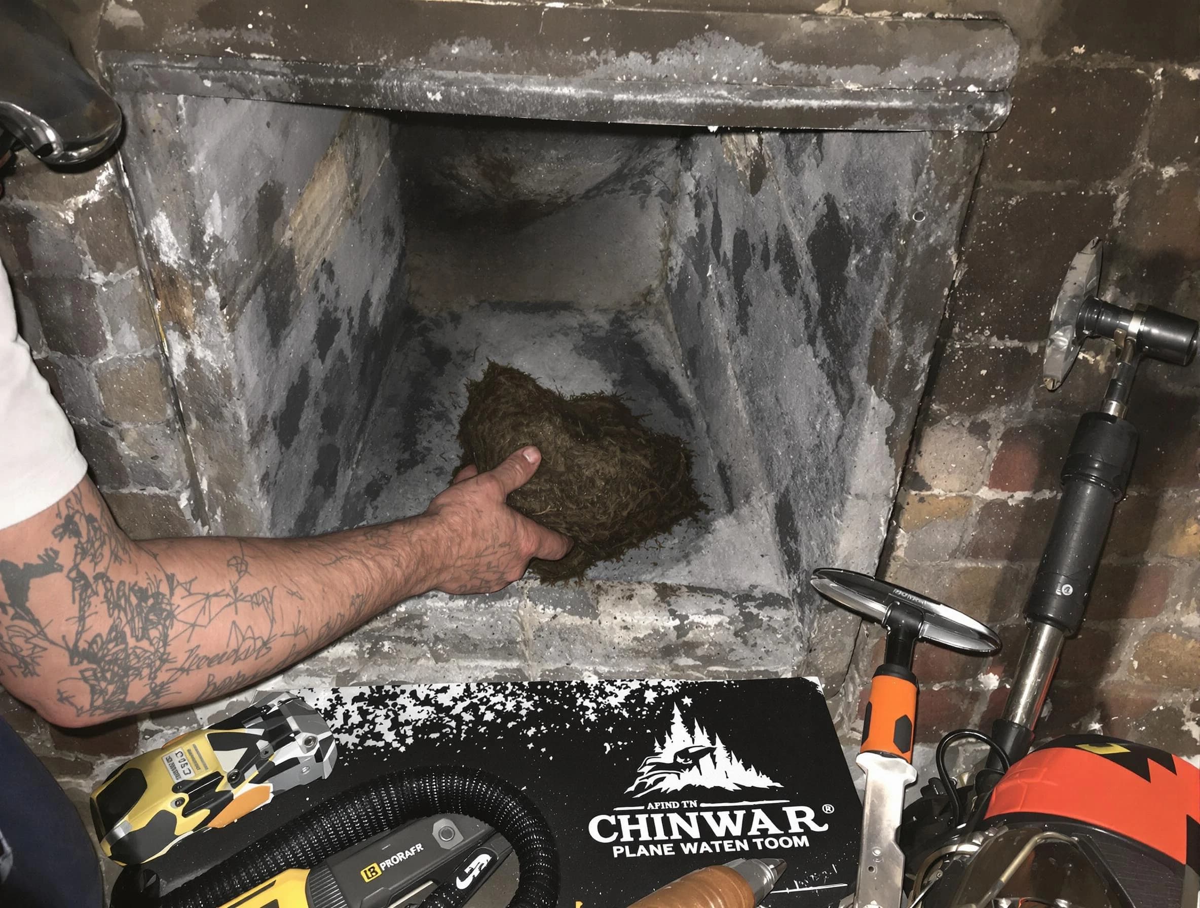 Bethel Park Chimney Sweep safely removing debris and screening chimney in Bethel Park, PA